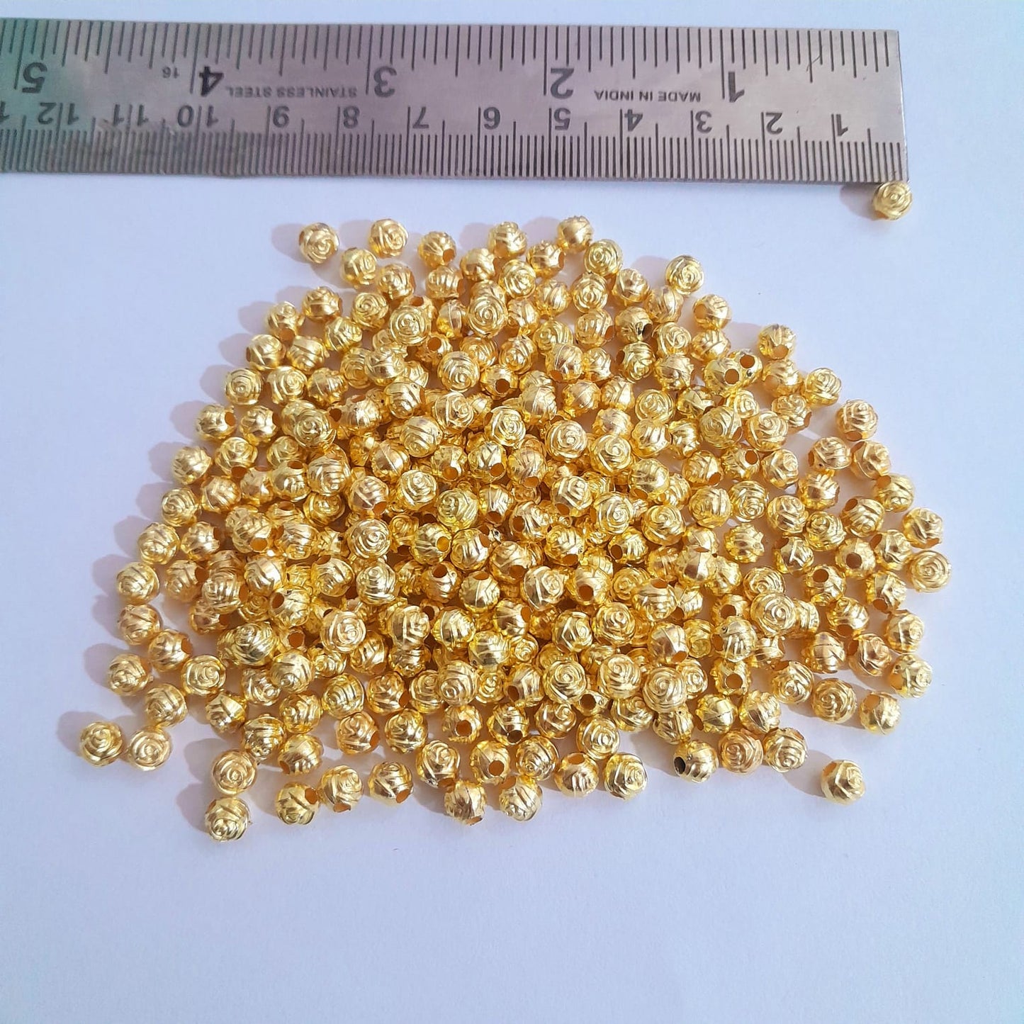 Gold Plastic Designed Beads