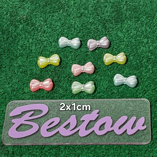 Plastic Multicolor bow beads - Set of 8